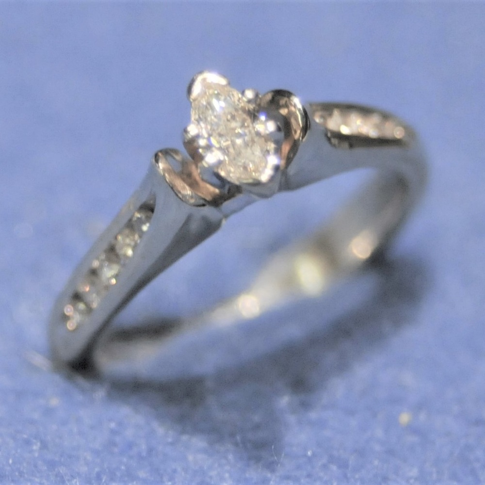 14 KW gold engagement ring. 3/4 CTW